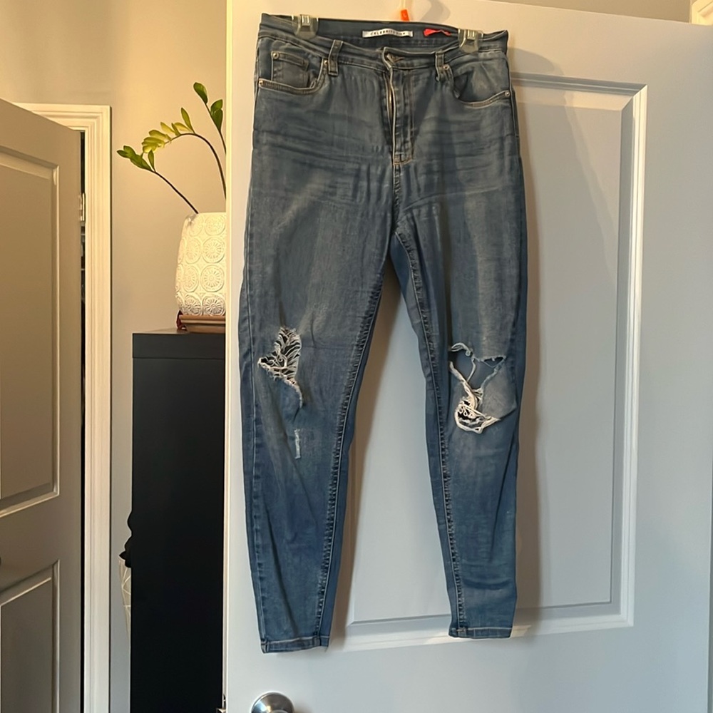 Ripped Stretchy Blue Jean “The Spice”